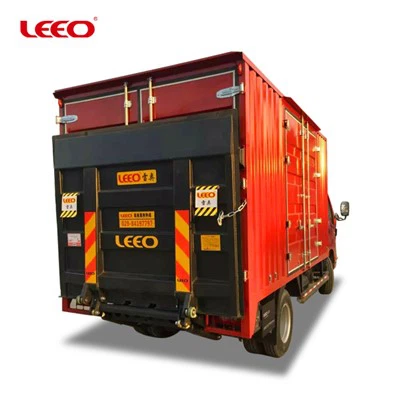 Bagaimana cara memasang pengaman pada tail lift truk?